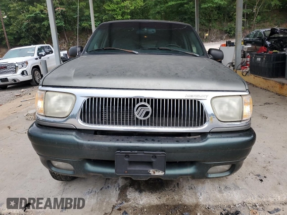1999 Mercury Mountaineer with VIN 4M2ZU52P9XUJ13428, listed as a Copart auction lot 70789964 with 191,042 mi miles and Salvage title. Bid and sale history available at DreamBid. Image 5.