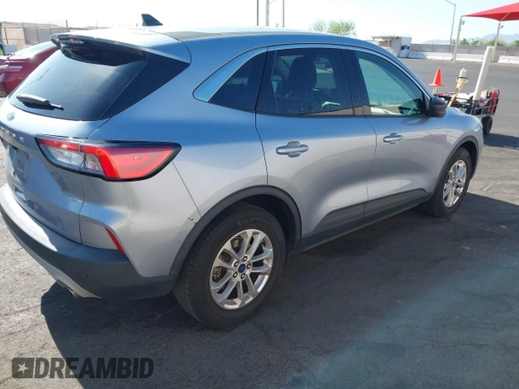 2022 Ford Escape SE z VIN 1FMCU0G6XNUB31007, wystawiony jako IAAI lot #42510666 z przebiegiem 106 236 mil mil oraz . Historia ofert i sprzedaży dostępna na DreamBid. Obrazek 4.