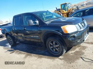 2014 Nissan Titan S with VIN 1N6AA0EC6EN506928, listed as a IAAI auction lot 41380319 with 102,669 mi miles. Bid and sale history available at carsss.com. Image 1.