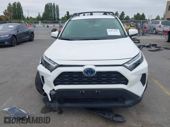 2023 Toyota RAV4 Hybrid LE with VIN JTMMWRFV3PD193495, listed as a IAAI auction lot 42475531 with 51,982 mi miles and . Bid and sale history available at DreamBid. Image 12.
