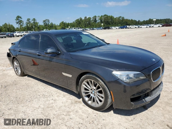2015 BMW 7 Series 740Li xDrive with VIN WBAYF4C58FGS99363, listed as a Copart auction lot 69837154 with 115,101 mi miles and Salvage Title. Bid and sale history available at carsss.com. Image 4.