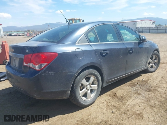 2014 Chevrolet Cruze 1LT with VIN 1G1PC5SB9E7114104, listed as a IAAI auction lot 42143300 with 161,552 mi miles and . Bid and sale history available at DreamBid. Image 4.