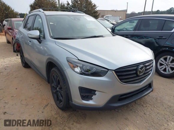 2016 Mazda CX-5 Grand Touring with VIN JM3KE4DY1G0616714, listed as a IAAI auction lot 41459781 with 90,763 mi miles. Bid and sale history available at carsss.com. Image 1.