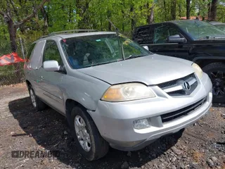 2004 Acura MDX Touring Pkg with VIN 2HNYD18664H517854, listed as a IAAI auction lot 41979134 with 144,713 mi miles. Bid and sale history available at carsss.com. Image 1.