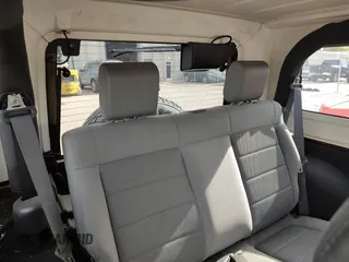 2008 Jeep Wrangler Sahara with VIN 1J4FA54118L537472, listed as a Copart auction lot 57785185 with 121,029 mi miles and Clean title. Bid and sale history available at DreamBid. Image 6.