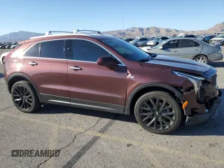2023 Cadillac XT4 AWD Luxury with VIN 1GYFZBR42PF107893, listed as a Copart auction lot 74989124 with 9,579 mi miles and Salvage Title. Bid and sale history available at carsss.com. Image 4.