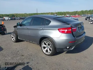 2014 BMW X6 xDrive35i z VIN 5UXFG2C57E0H10305, wystawiony jako IAAI lot #42109416 z przebiegiem 144 816 mil mil oraz . Historia ofert i sprzedaży dostępna na DreamBid. Obrazek 3.