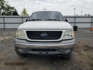 2003 Ford F-150 XL z VIN 2FTRX18L93CA55860, wystawiony jako Copart lot #57402295 z przebiegiem 312 879 mil mil oraz Szkoda całkowita • Salvage title. Historia ofert i sprzedaży dostępna na DreamBid. Obrazek 5.