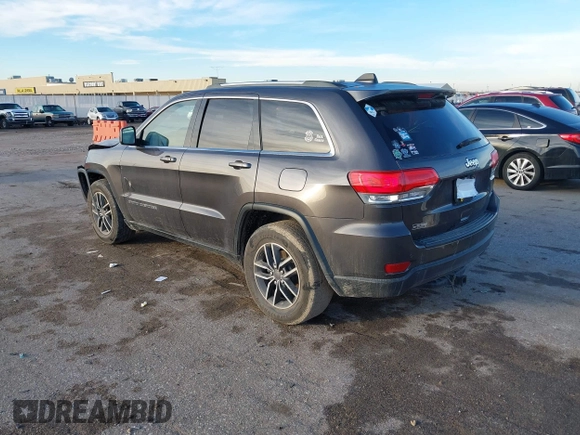 2019 Jeep Grand Cherokee Altitude with VIN 1C4RJEAG2KC698822, listed as a IAAI auction lot 41476562 with 128,035 mi miles and . Bid and sale history available at DreamBid. Image 3.