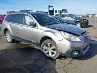 2014 Subaru Outback 2.5i Limited with VIN 4S4BRBLC7E3325536, listed as a IAAI auction lot 41209727 with 128,758 mi miles. Bid and sale history available at carsss.com. Image 1.