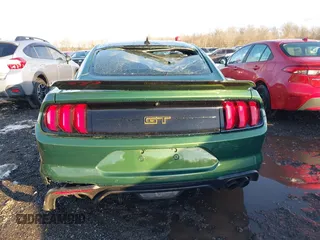 2022 Ford Mustang GT with VIN 1FA6P8CFXN5113099, listed as a IAAI auction lot 41243998 with 9,475 mi miles and . Bid and sale history available at DreamBid. Image 16.