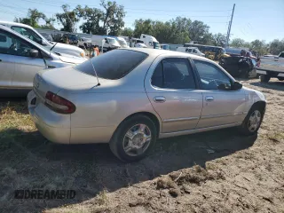 1996 Nissan Altima XE z VIN 1N4BU31D0TC157956, wystawiony jako Copart lot #80838464 z przebiegiem 132 503 mil mil oraz Szkoda całkowita • Salvage title. Historia ofert i sprzedaży dostępna na DreamBid. Obrazek 3.