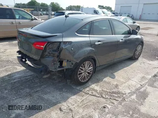 2018 Ford Focus Titanium с VIN 1FADP3J23JL272028, выставлен на аукционе IAAI как лот 42395402 с пробегом 125 975 миль миль и . История ставок и продаж доступна на DreamBid. Изображение 4.