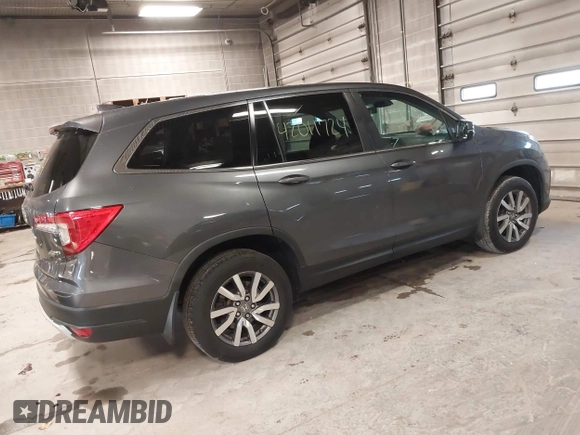 2019 Honda Pilot EX-L with VIN 5FNYF6H50KB035548, listed as a IAAI auction lot 42011724 with 105,195 mi miles and . Bid and sale history available at DreamBid. Image 4.