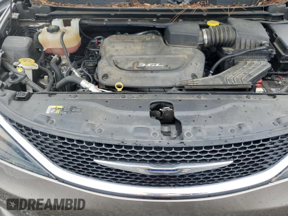 2017 Chrysler Pacifica Touring with VIN 2C4RC1DG6HR552700, listed as a Copart auction lot 61365895 with 128,407 mi miles and Salvage title. Bid and sale history available at DreamBid. Image 12.