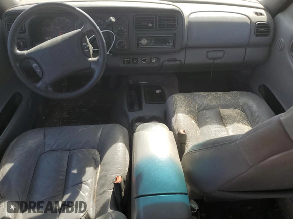 1999 Dodge Durango z VIN 1B4HS28Z1XF528727, wystawiony jako Copart lot #77621824 z przebiegiem 164 880 mil mil oraz Szkoda całkowita • Salvage title. Historia ofert i sprzedaży dostępna na DreamBid. Obrazek 8.