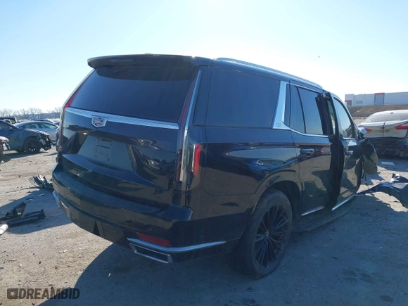2021 Cadillac Escalade Premium Luxury Platinum with VIN 1GYS4DKL6MR477152, listed as a IAAI auction lot 41388523 with 60,719 mi miles. Bid and sale history available at carsss.com. Image 4.