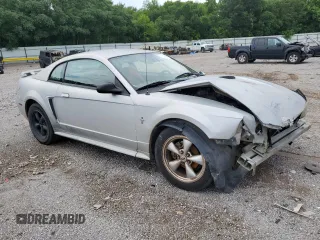 2002 Ford Mustang Standard with VIN 1FAFP40412F190297, listed as a Copart auction lot 61251985 with Not provided miles and Salvage title. Bid and sale history available at DreamBid. Image 4.