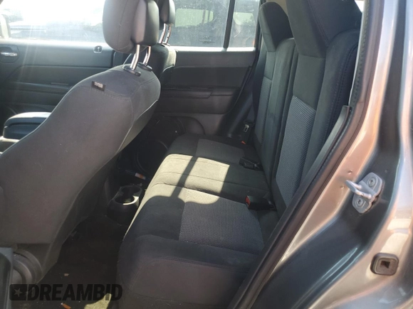 2014 Jeep Patriot Latitude with VIN 1C4NJPFA8ED618680, listed as a Copart auction lot 63998045 with 143,728 mi miles and Clean title. Bid and sale history available at DreamBid. Image 11.