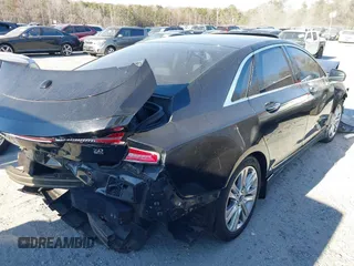 2016 Lincoln MKZ with VIN 3LN6L2G97GR624238, listed as a IAAI auction lot 41642853 with 205,832 mi miles. Bid and sale history available at carsss.com. Image 4.