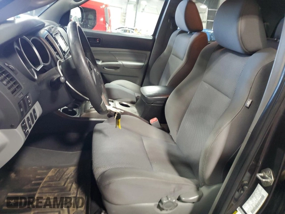 2014 Toyota Tacoma with VIN 3TMLU4EN3EM151500, listed as a Copart auction lot 57147705 with 170,240 mi miles and Salvage title. Bid and sale history available at DreamBid. Image 7.
