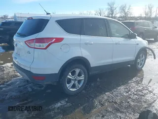 2013 Ford Escape SE with VIN 1FMCU9GX2DUD19077, listed as a IAAI auction lot 41578028 with 124,890 mi miles. Bid and sale history available at carsss.com. Image 4.