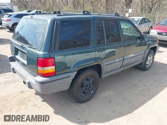 1994 Jeep Grand Cherokee Laredo with VIN 1J4GZ58S0RC266616, listed as a IAAI auction lot 41890812 with 190,000 mi miles. Bid and sale history available at carsss.com. Image 4.