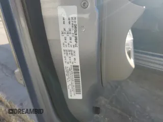 2014 Dodge Grand Caravan SXT with VIN 2C4RDGCG1ER121033, listed as a Copart auction lot 52030715 with 105,451 mi miles and Salvage Title. Bid and sale history available at DreamBid. Image 13.
