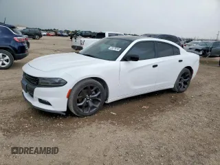 2015 Dodge Charger SXT with VIN 2C3CDXHG8FH725284, listed as a Copart auction lot 63679245 with 145,842 mi miles and Salvage title. Bid and sale history available at DreamBid. Image 1.