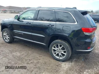 2015 Jeep Grand Cherokee Summit with VIN 1C4RJFJGXFC882787, listed as a IAAI auction lot 42098274 with 147,020 mi miles and . Bid and sale history available at DreamBid. Image 3.