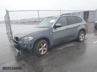 2009 BMW X5 30i with VIN 5UXFE43579L271366, listed as a IAAI auction lot 41831724 with 129,107 mi miles. Bid and sale history available at carsss.com. Image 2.