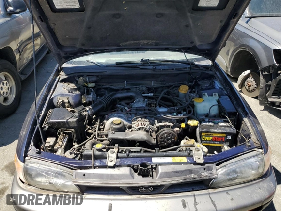 1996 Subaru Impreza Outback with VIN JF1GF4851TG811571, listed as a Copart auction lot 65650514 with 248,315 mi miles and Salvage title. Bid and sale history available at DreamBid. Image 11.