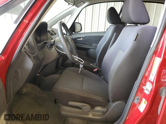 2013 Suzuki SX4 Crossover z VIN JS2YB5A38D6100035, wystawiony jako Copart lot #59970015 z przebiegiem 119 995 mil mil oraz Szkoda całkowita • Salvage title. Historia ofert i sprzedaży dostępna na DreamBid. Obrazek 7.