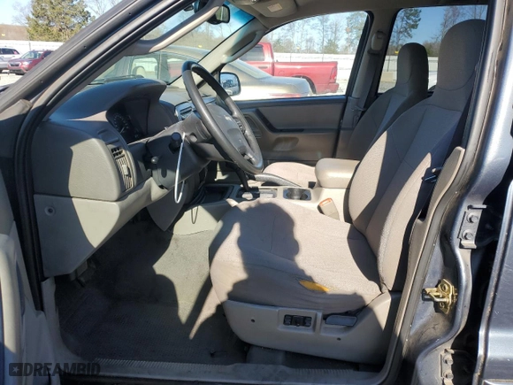 2004 Jeep Grand Cherokee Laredo with VIN 1J4GX48S54C161417, listed as a Copart auction lot 49834645 with 281,751 mi miles and Salvage Title. Bid and sale history available at carsss.com. Image 7.