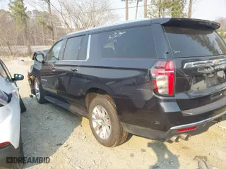2023 Chevrolet Suburban Premier with VIN 1GNSKFKD4PR334079, listed as a IAAI auction lot 41657744 with 61,409 mi miles. Bid and sale history available at carsss.com. Image 3.
