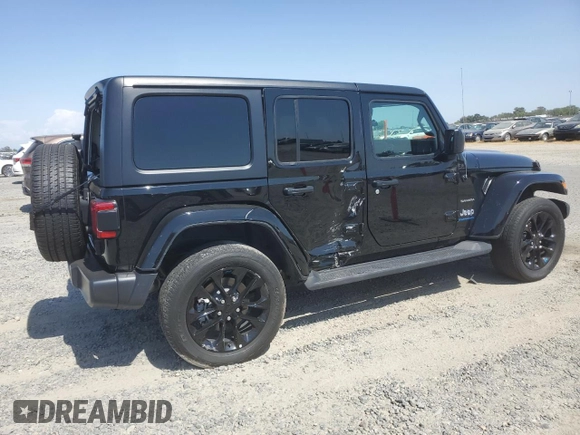 2023 Jeep Wrangler Sahara with VIN 1C4JJXP61PW512975, listed as a Copart auction lot 59392075 with 26,954 mi miles and Salvage title. Bid and sale history available at DreamBid. Image 3.