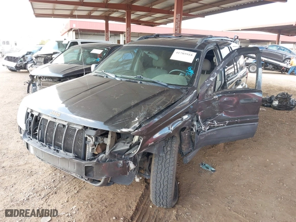2004 Jeep Grand Cherokee Laredo with VIN 1J4GX48N64C436853, listed as a IAAI auction lot 41785918 with 118,578 mi miles. Bid and sale history available at carsss.com. Image 16.