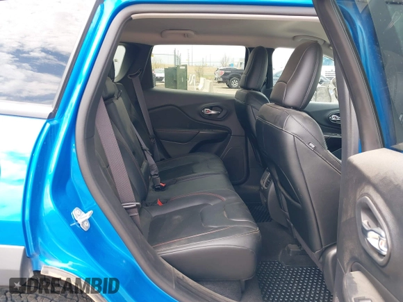 2022 Jeep Cherokee Trailhawk z VIN 1C4PJMBX4ND513488, wystawiony jako IAAI lot #42137114 z przebiegiem 12 306 mil mil oraz . Historia ofert i sprzedaży dostępna na DreamBid. Obrazek 8.