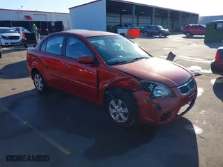 2011 Kia Rio LX with VIN KNADH4A33B6959805, listed as a IAAI auction lot 41452696 with 182,426 mi miles. Bid and sale history available at carsss.com. Image 1.