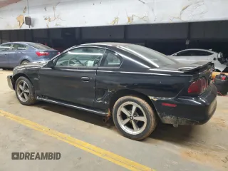 1997 Ford Mustang GT with VIN 1FALP42X4VF192088, listed as a Copart auction lot 84714114 with 194,845 mi miles and Salvage title. Bid and sale history available at DreamBid. Image 2.
