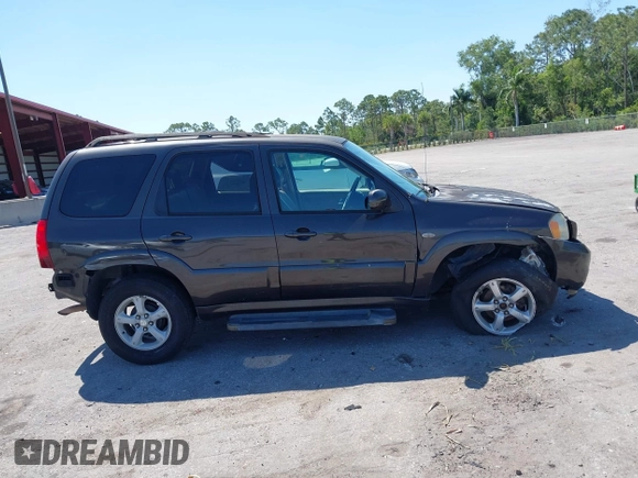 2006 Mazda Tribute i with VIN 4F2YZ02Z36KM29148, listed as a IAAI auction lot 42044163 with 175,786 mi miles and . Bid and sale history available at carsss.com. Image 13.