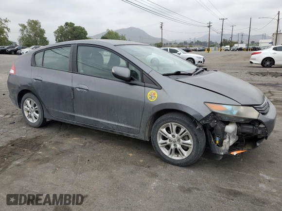 2010 Honda Insight EX with VIN JHMZE2H79AS017647, listed as a Copart auction lot 53311325 with 94,999 mi miles and Salvage Title. Bid and sale history available at DreamBid. Image 4.