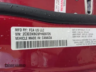 2023 Dodge Charger SXT with VIN 2C3CDXBG9PH659726, listed as a IAAI auction lot 42103636 with 14,321 mi miles and . Bid and sale history available at DreamBid. Image 9.