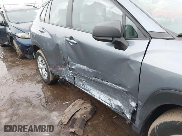 2022 Toyota Corolla Cross L with VIN 7MUAAABG3NV040858, listed as a IAAI auction lot 41471785 with 37,403 mi miles and . Bid and sale history available at DreamBid. Image 6.