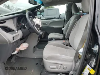 2015 Toyota Sienna LE AAS with VIN 5TDKK3DC5FS550597, listed as a Copart auction lot 51458215 with 74,090 mi miles and Salvage Title. Bid and sale history available at DreamBid. Image 7.