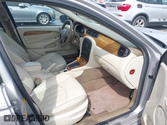 2003 Jaguar X-Type 2.5L Manual with VIN SAJEA51D33XC93300, listed as a IAAI auction lot 42048118 with 116,939 mi miles and . Bid and sale history available at DreamBid. Image 5.