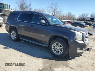 2015 GMC Yukon SLT with VIN 1GKS2BKC8FR232912, listed as a Copart auction lot 46548385 with 221,353 mi miles and Salvage Title. Bid and sale history available at carsss.com. Image 4.