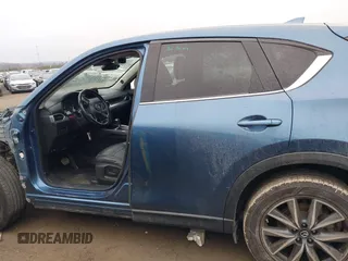 2017 Mazda CX-5 Grand Touring with VIN JM3KFADL9H0187338, listed as a IAAI auction lot 41382034 with 141,972 mi miles and . Bid and sale history available at carsss.com. Image 15.
