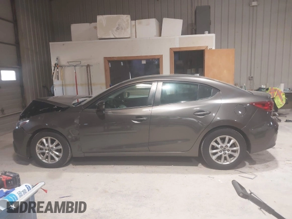 2014 Mazda 3 i Touring with VIN 3MZBM1V75EM104865, listed as a IAAI auction lot 41979187 with 98,237 mi miles and . Bid and sale history available at DreamBid. Image 14.