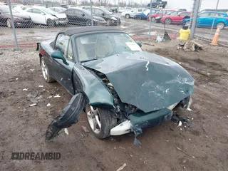 2002 Mazda MX-5 Miata Cloth z VIN JM1NB353320232406, wystawiony jako IAAI lot #41581908 z przebiegiem 175 396 mil mil oraz . Historia ofert i sprzedaży dostępna na DreamBid. Obrazek 1.